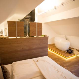 Offene Suite mit Whilwanne Deluxe Suite